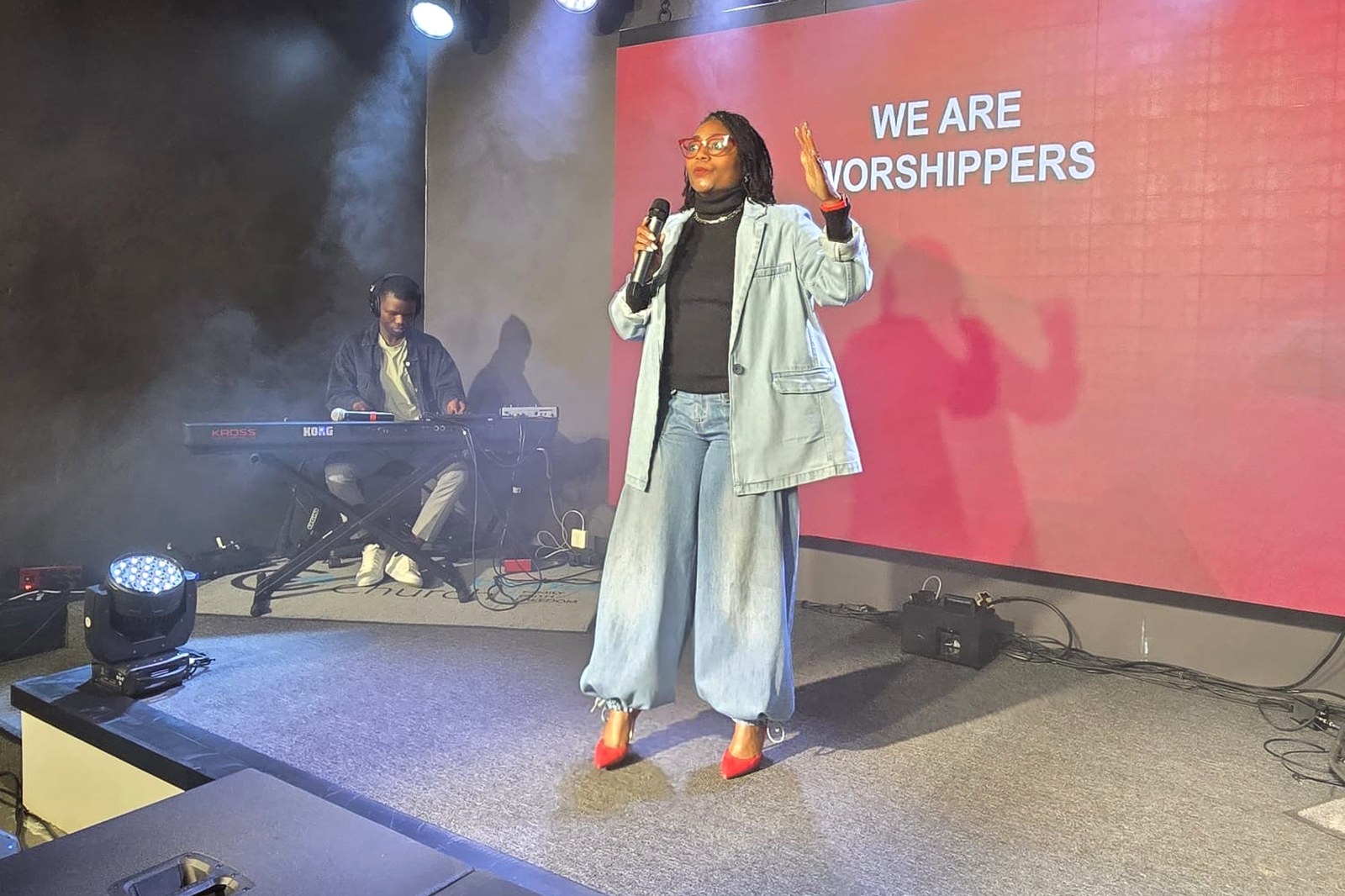 Regina Guidry leading worship at Intentional Church