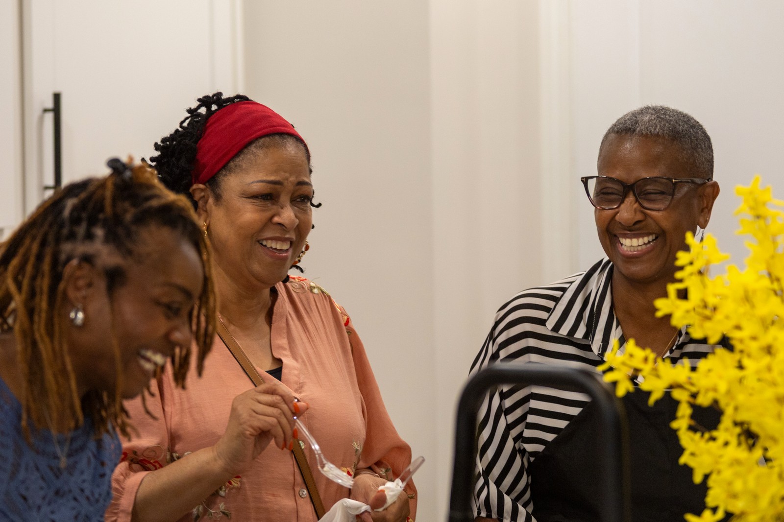 Women laughing together at an Intentional Church gathering
